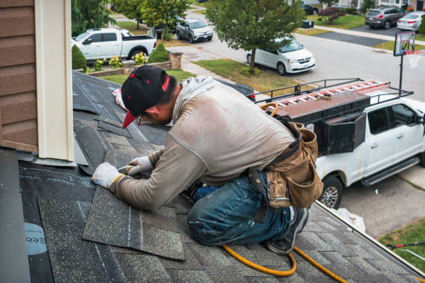 Professional Roofing technician working in Clay City, IN